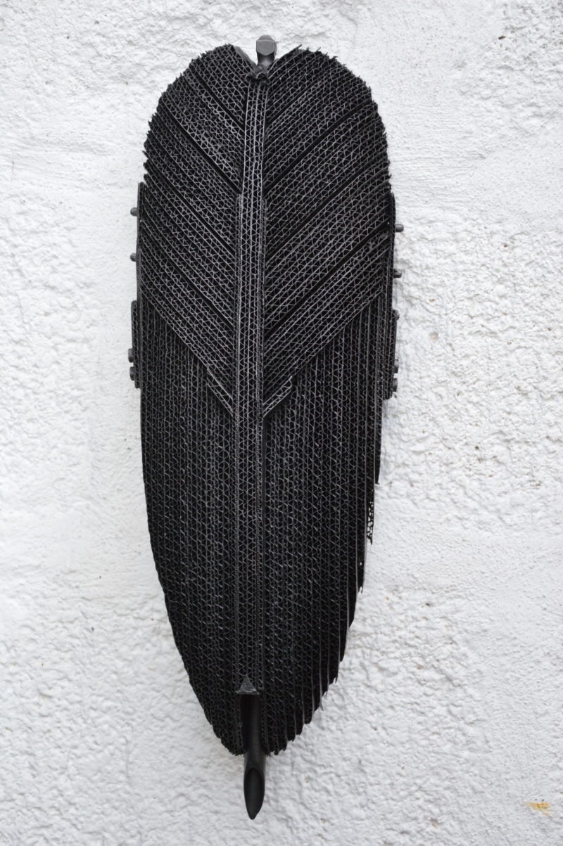 black cardboard wall sculpture by pierre riba available in the gallery's store22.