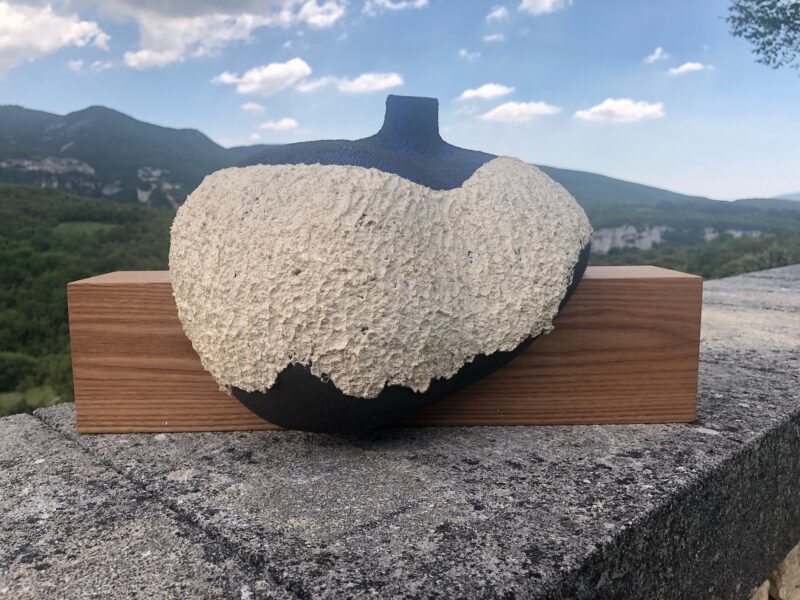 contemporary sculpture in blue ceramic on oak support by christiane filliatreau in stoneware
