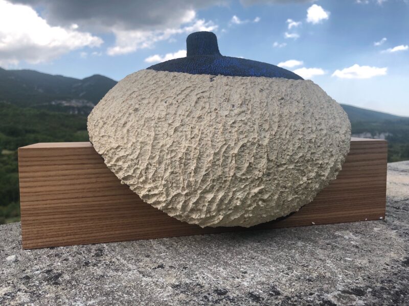 contemporary sculpture in blue ceramic on oak support by christiane filliatreau in stoneware