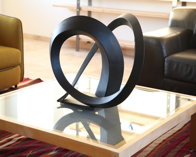 contemporary sculpture in black patinated aluminium by francis guerrier